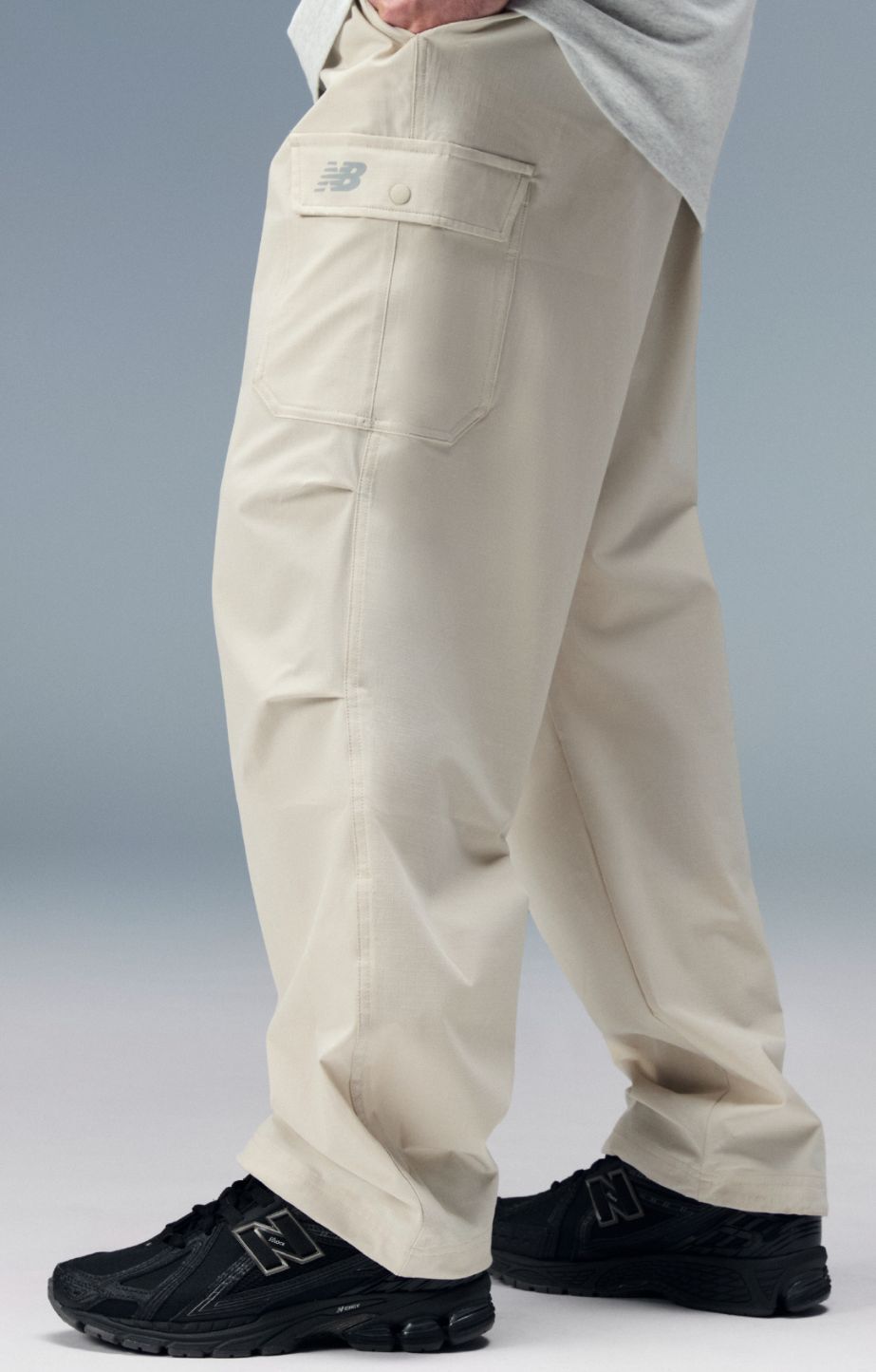 A person wearing new balance 1906s